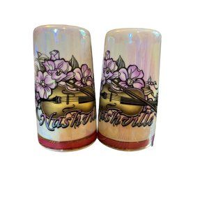 New/unused NASHVILLE Salt and a pepper shakers with flowers and guitar 3” tall